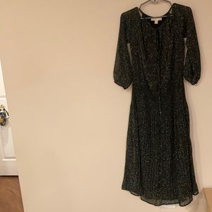 Bohemian ruched, pleated, and cold shoulder key hole tie midi dress.